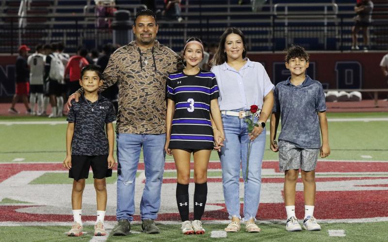 (THOMAS WALLNER | THE GRAHAM LEADER) Haley Escalante is honored during senior night with her family.