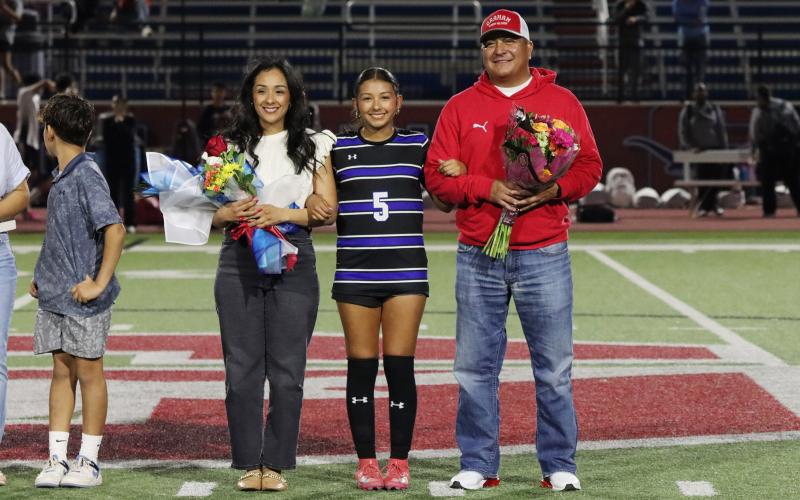 (THOMAS WALLNER | THE GRAHAM LEADER) Mai Bara is honored during senior night with her family.