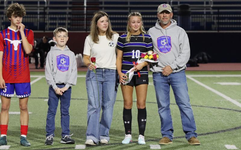 (THOMAS WALLNER | THE GRAHAM LEADER) Mylee Lattimore is honored during senior night with her family.