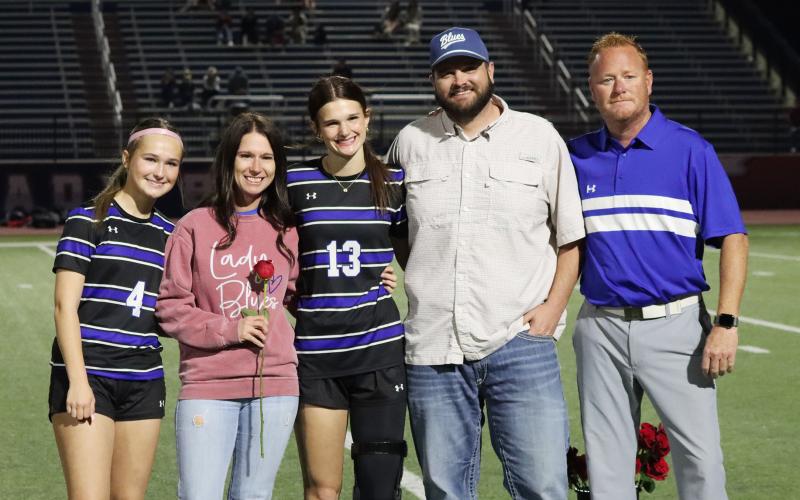 (THOMAS WALLNER | THE GRAHAM LEADER) Tara Dawson is honored during senior night with her family.