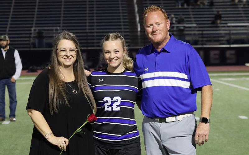 (THOMAS WALLNER | THE GRAHAM LEADER) Ermaleigh Criswelle is honored during senior night with her family.