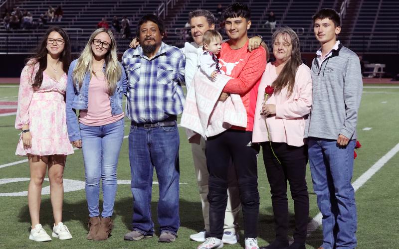(THOMAS WALLNER | THE GRAHAM LEADER) Max Coyac is honored during senior night with his family.