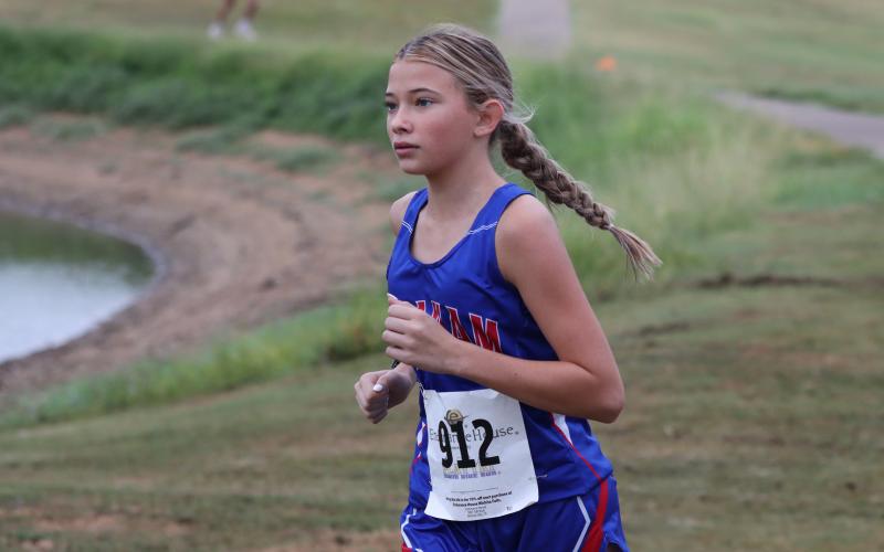 (KYLIE BAILEY | THE GRAHAM LEADER) Taylan Locker competes Wednesday, Aug. 20 in the Nocona CC Relay. Her and her teammate, Angela Fuentes, finished 19th in the relay.