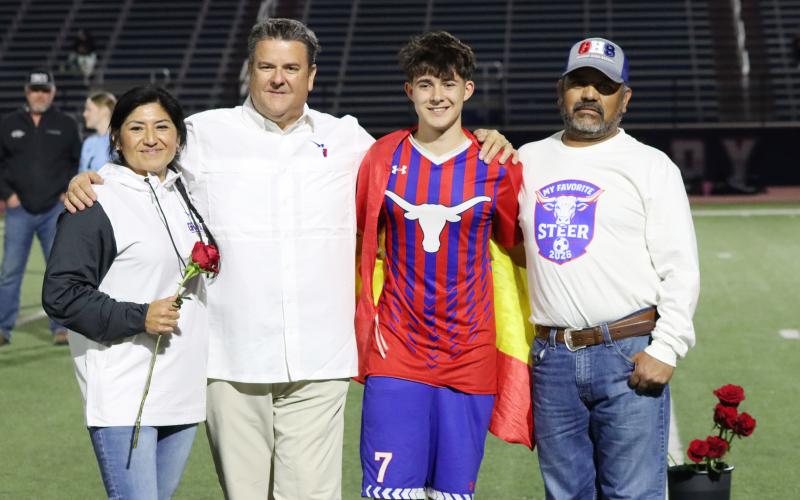 (THOMAS WALLNER | THE GRAHAM LEADER) Exchange student Pablo Gonzalez is honored during senior night with his host family.