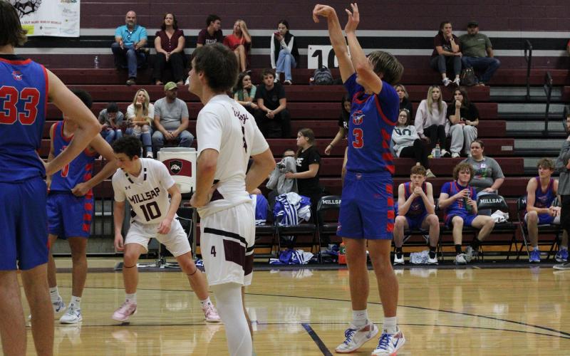 (ALEX HAVARDANKSY | THE GRAHAM LEADER) Jagger Nees shoots a free throw at the line Tuesday, Nov. 18 against the Millsap Bulldogs. Nees led the way in scoring with 29 points in the Steers blowout victory. 