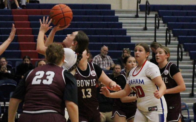 (ALEX HAVARDANSKY | THE GRAHAM LEADER) McKynley Corley puts the ball up for a layup Thursday. Nov. 20 against the Bowie Lady Rabbits. Corley was one of the opening scorers for the Lady Blues in their 48-13 victory. 