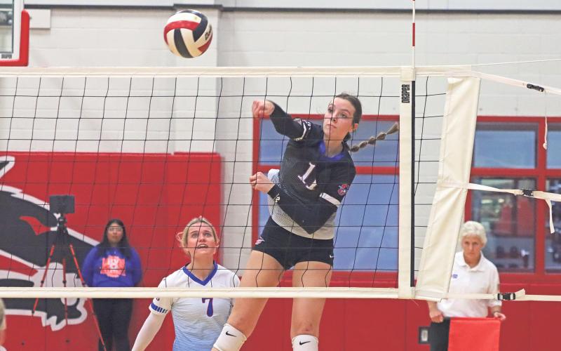 (ARCHIVE PHOTO | THE GRAHAM LEADER) Graham senior Lillian Noble smacks a ball toward the sideline for a point Monday, Nov. 4 during the Lady Blues’ 3-0 bi-district win over Levelland.