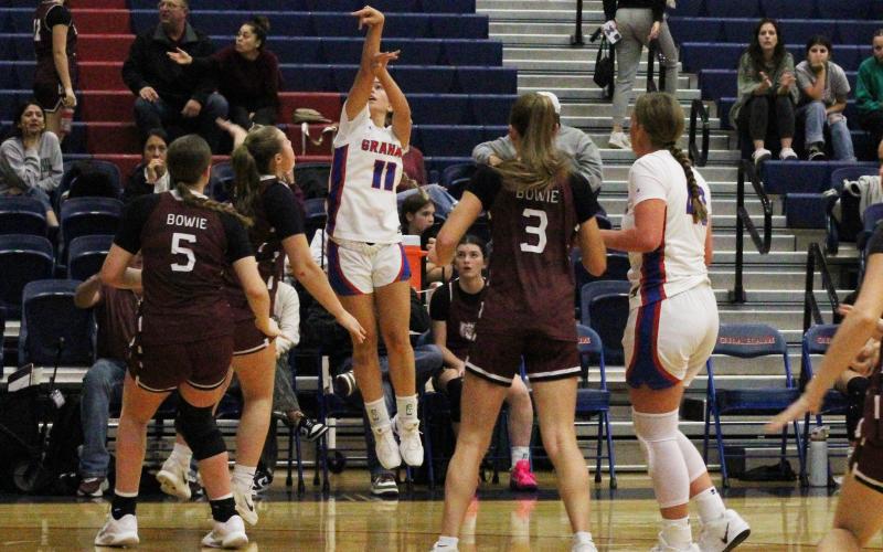 (ALEX HAVARDANSKY | THE GRAHAM LEADER) Ava Street shoots a shot from the corner Thursday, Nov. 20 against the Bowie Bowie Lady Rabbits. Street hit the go-ahead shot for the Lady Blues in their 35-32 win.
