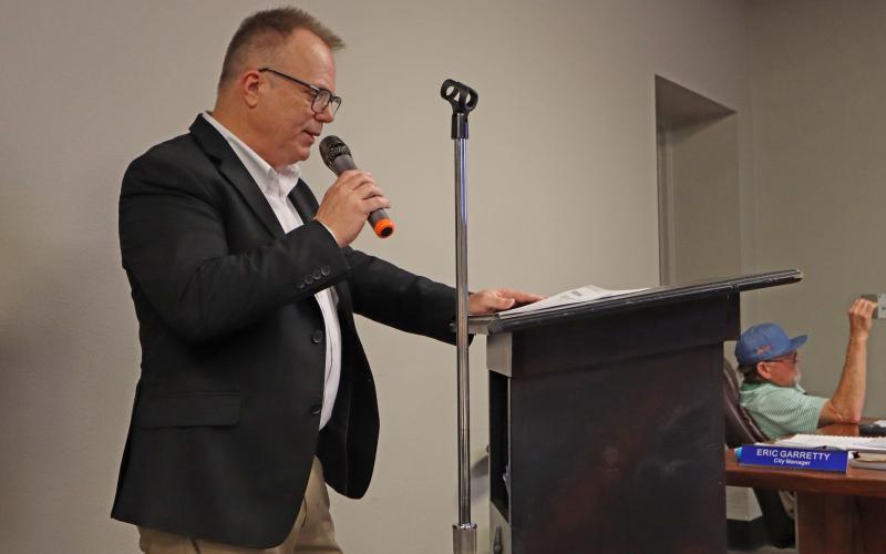(THOMAS WALLNER | THE GRAHAM LEADER) Graham City Manager Eric Garretty speaks with the Graham City Council regarding the upcoming fiscal year budget and decisions that may have to be made regarding potential cuts. 