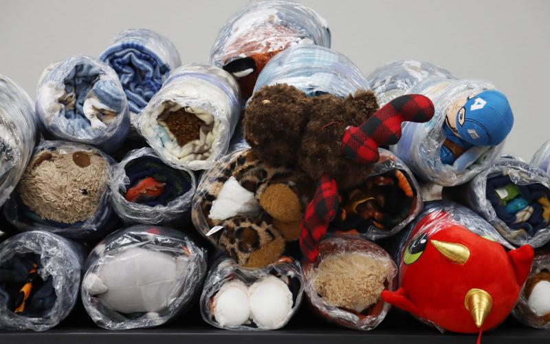 (THOMAS WALLNER | THE GRAHAM LEADER) Bundles of blankets, stuffed animals and goody bags which will be delivered to Young County’s first responders to be given to children in crisis at scenes. A total of 153 bundles will be distributed before Christmas.