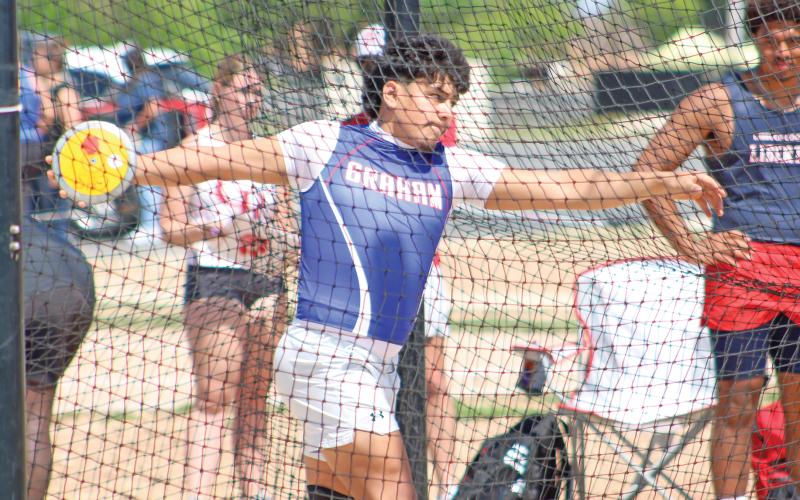 (ALEX HAVARDANSKY | THE GRAHAM LEADER) Mateo Rodriguez makes his discus throw at the area meet Friday, April 11 in Abilene. Rodriguez placed fifth in the area event.