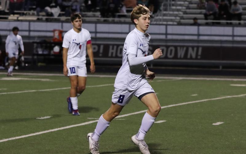 (KYLIE BAILEY | THE GRAHAM LEADER) Timmy Thetford runs up the field Friday, Feb. 20 against Bridgeport. Thetford has been one of the team’s key position players all season. 