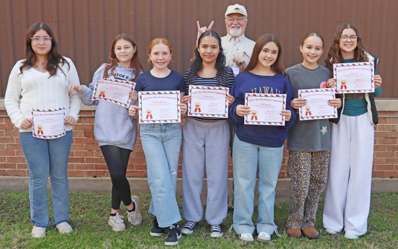 (THOMAS WALLNER | THE GRAHAM LEADER) Members of Cocoa Cuties pose with members of their nonprofit The Rock. Team members are Davee Campbell, Airianna Hogue, Melanie Huerta, Marley Kincaid, Charlie Grace Edwards, Rhema Frank, Mackenzie Hufstedler and Ariela Ramirez.