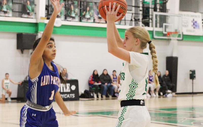 (ALEX HAVARDANSKY | THE GRAHAM LEADER) Allison Melton looks to pass the ball to a teammate in one of the Ladycats’ previous matchups. The Ladycats participated in a basketball tournament in Whiteface against four teams from Thursday, Dec. 4 to Saturday Dec. 6. 