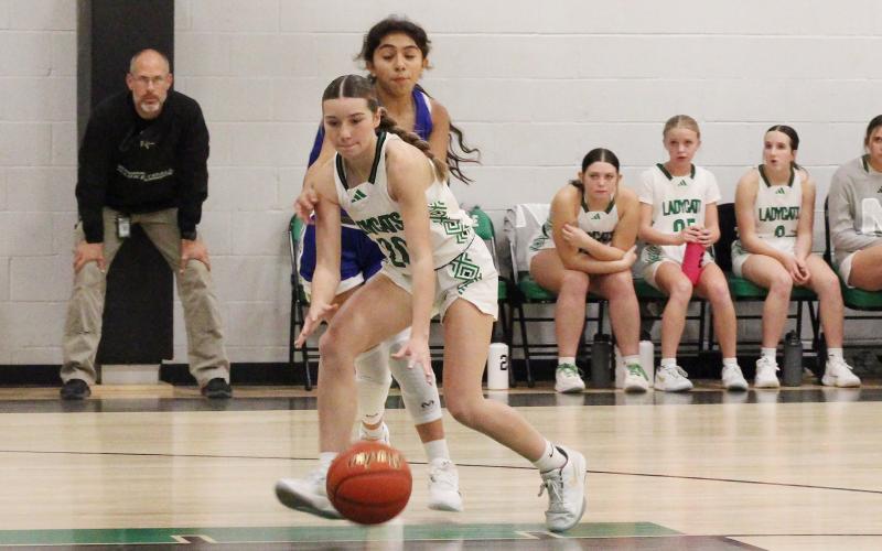 (ALEX HAVARDANSKY | THE GRAHAM LEADER) Greenleigh Moore fights her way into the paint in one of the Ladycats’ previous matchups. The Ladycats picked up a victory against Wellman Union during a tournament in Whiteface from Thursday Dec. 4 to Saturday Dec. 6. 