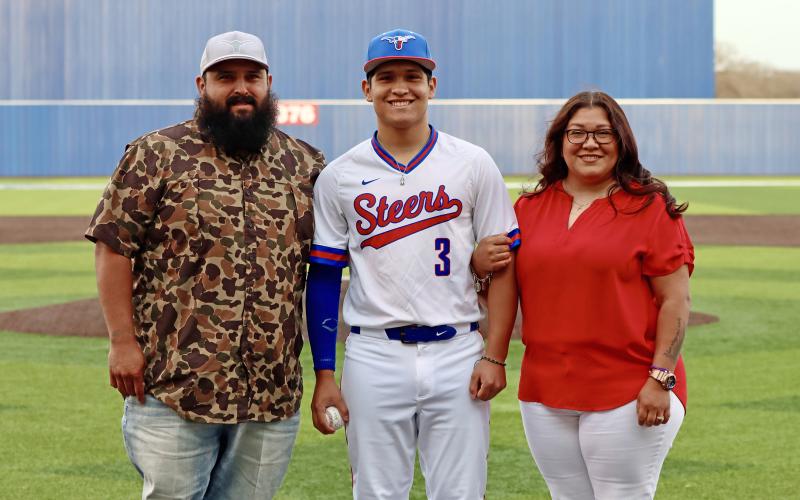 (THOMAS WALLNER | THE GRAHAM LEADER) Senior Mike Garcia was recognized during senior night Tuesday, March 17.