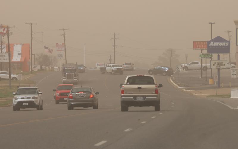 (THOMAS WALLNER | THE GRAHAM LEADER) A thick layer of dust covers the air in Graham due to dust being blown in Friday, March 14 from West Texas and New Mexico. With winds and dry weather predicted this week, the fire risk remains.