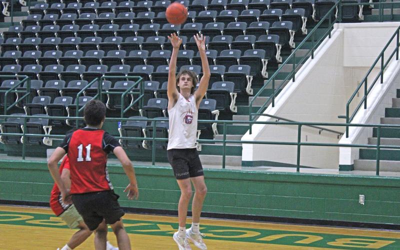 (ALEX KIELAR | BRECKENRIDGE AMERICAN) Nick Wankowicz shoots a three from the corner Tuesday, June 10 against the Olney Cubs. Wankowicz has been a consistent presence in the paint, using his long wingspan to grab rebounds and second chance opportunities.