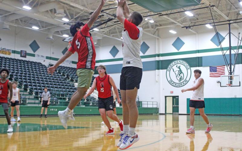 (ALEX KIELAR | BRECKENRIDGE AMERICAN) Guard Jagger Nees shoots a three from the left corner Tuesday, June 10 against the Olney Cubs. Nees has been the main distributor and facilitator for the offense.