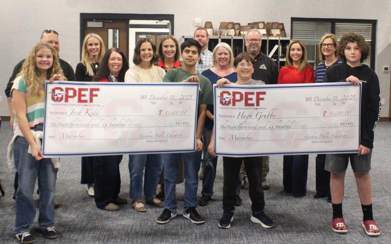 (ALEX HAVARDANSKY | THE GRAHAM LEADER) The Graham High School and Graham Junior High School band programs were presented grants to purchase new instruments. The grants were provided by the Graham Public Education Foundation during their distribution Thursday, Dec. 11. 