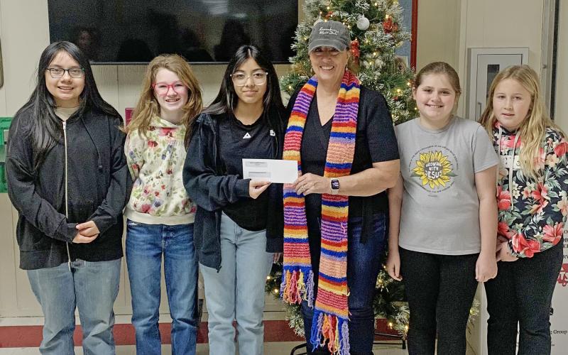 (TRACEY TERASAS | CONTRIBTUED PHOTO) Members of The 5 Reindeers pose for a photo after the announcement of the results from the Hot Chocolicious competition. Team members are Carrie Ann Collins, Hailey Teall, Sofia Barrios, Dayana Ibarra and Jayden Wooldridge.
