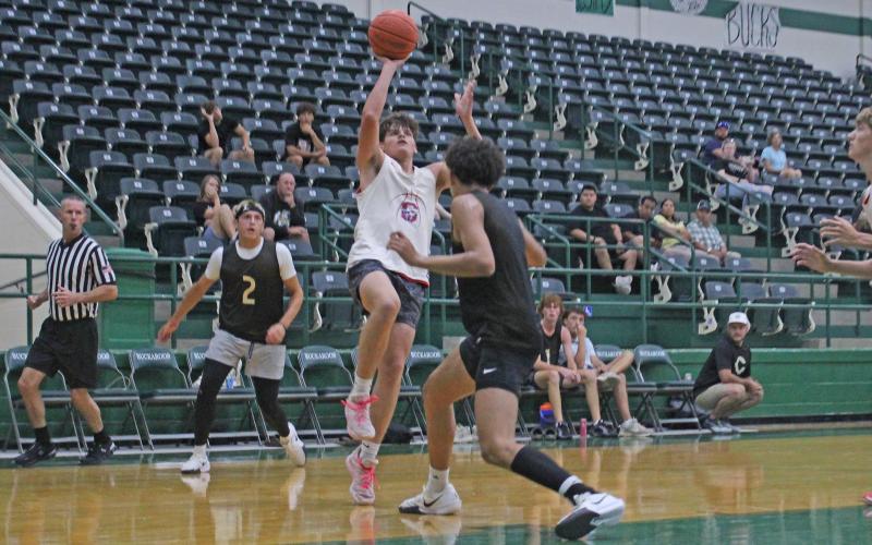(ALEX KIELAR | THE GRAHAM LEADER) Bryce Martin goes up for a shot for the Steers in their game against the Clyde Bulldogs during the final week of the Breckenridge summer basketball league Tuesday, June 24. Martin finished the first of two games on the evening with 12 points. 