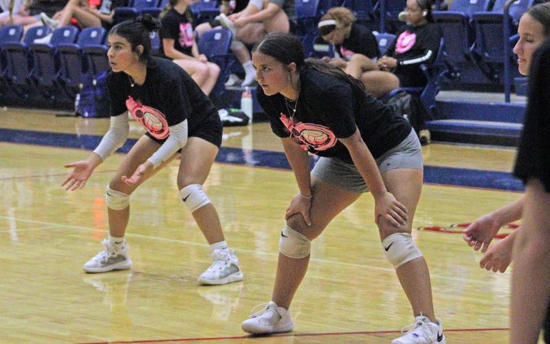 (ALEX HAVARDANSKY | THE GRAHAM LEADER) ALEX HAVARDANSKY | THE GRAHAM LEADER Several members of the Newcastle Ladycats stand ready on defense Monday, June 9. The Ladycats opened their schedule Monday against the Perrin-Whitt Pirates. 