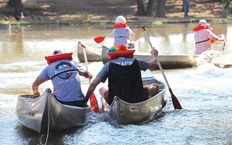 (ARCHIVE PHOTO | THE GRAHAM LEADER) A canoe race at Firemen's Park as part of the Rotary Club of Graham's Duck Derby event. The canoe race will return this year at the park and feature third-party duck sales participants.