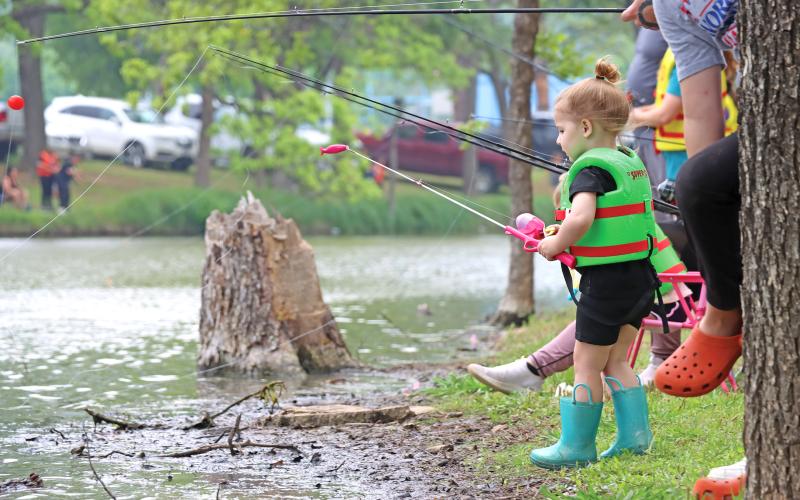 (ARCHIVE PHOTO | THE GRAHAM LEADER) Those big and small attended the annual Family Fun and Fishing event in 2024 at Firemen’s Park in Graham. The fishing tournament will be held from 10 a.m. to noon Saturday, April 26 at Firemen Park. 