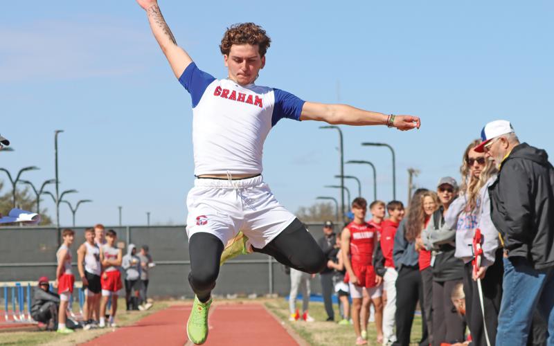 (THOMAS WALLNER | THE GRAHAM LEADER) Jordan Alexander of the Steers varsity team performs a high jump in the PK Relays held Saturday, March 15 in Graham. Alexander is a two-year member of the varsity team and has stuck with three field events which he has excelled in so far through this season.