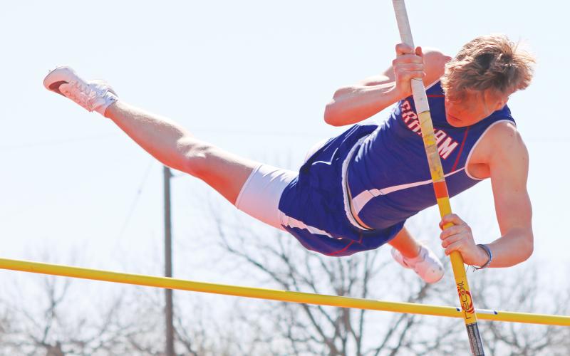 (THOMAS WALLNER | THE GRAHAM LEADER) Gabe Shook took first in the Pole Vault Small School 1A, 2A event held Saturday, March 15 during the PK Relay. Graham hosted over 25 schools at Newton Field for the event which has been ongoing for 77 years. 