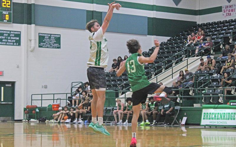 (ALEX KIELAR | BRECKENRIDGE AMERICAN) Tristan Clemons shoots a 3-point shot from the top right part of the court Tuesday, June 10 against the Breckenridge Buckaroos. Clemons and his teammate Keyton Newland scored over half of Newcastle points in the contest.
