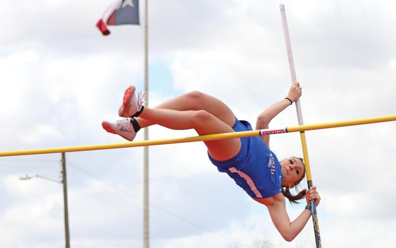 (THOMAS WALLNER | THE GRAHAM LEADER) Addelynn Fade of the Lady Blues scored a third place spot in pole vault during the PK Relays held Saturday, March 15 at Newton Field. Multiple events were held on the field at once and were followed by the running events.
