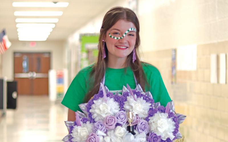 (THOMAS WALLNER | THE GRAHAM LEADER) Newcastle senior Ashleigh Taylor poses for a photo while showing her school spirit for homecoming which was Friday, Sept. 27. Along with numerous other achievements, Taylor recently received the news she made a perfect score on the math portion of the ACT.