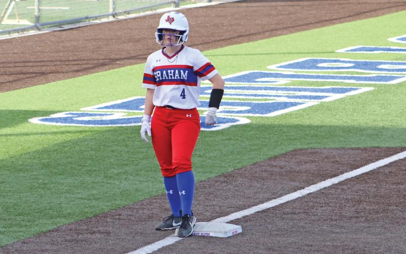 (ALEX HAVARDANSKY | THE GRAHAM LEADER) Montana Guinn waiting patiently at third base after subbing in as a pinch runner during the Tuesday, March 19 district opener against Stephenville.