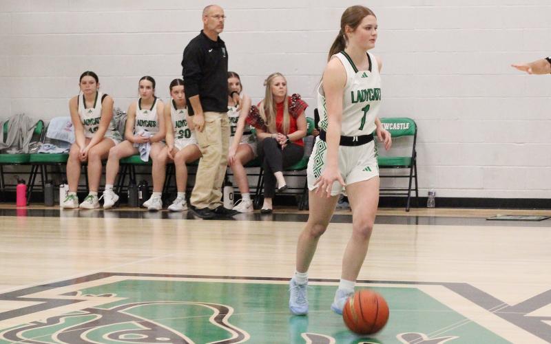 (ALEX HAVARDANSKY | THE GRAHAM LEADER) Camren Mallory dribbles the ball up court for the Ladycats in their matchup Thursday, Dec. 18 against the Mineral Wells Lady Rams. Mallory scored seven points in the Ladycats 32-16 loss. 