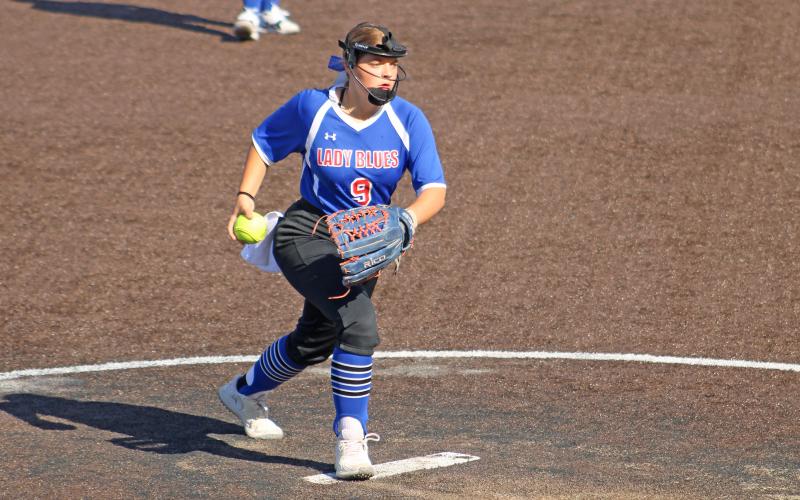 (ALEX HAVARDANSKY | THE GRAHAM LEADER) Ruby Shaffer up on the mound for the Lady Blues in their matchup Tuesday, April 15 against the Lady Lions. Shaffer serves as both a pitcher for the junior varsity team and a second baseman for the varsity team.