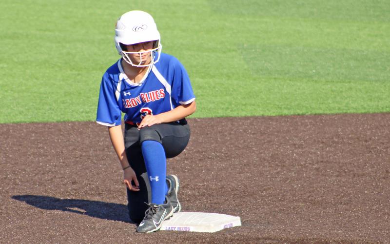 (ALEX HAVARDANSKY | THE GRAHAM LEADER) Natalie Hunter in position to steal from second for the Lady Blues in their matchup Tuesday, April 15. Baserunning opportunities were crucial in the Lady Blues 10-6 against the Lady Lions.