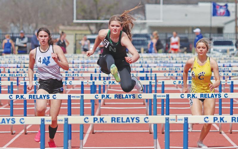 (ARCHIVE PHOTO | THE GRAHAM LEADER) Ladycat Camren Mallory competes in the 100-Meter Hurdles event at the 77th annual PK Relays held Saturday, March 15. Mallory came in second in the event with a time of 17.66.