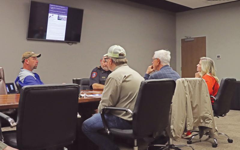 (THOMAS WALLNER | THE GRAHAM LEADER) Texas Department of Transportation Graham Area Engineer Zach Husen speaks with the Transportation Improvements Committee for the city of Graham during their meeting Thursday, April 3.