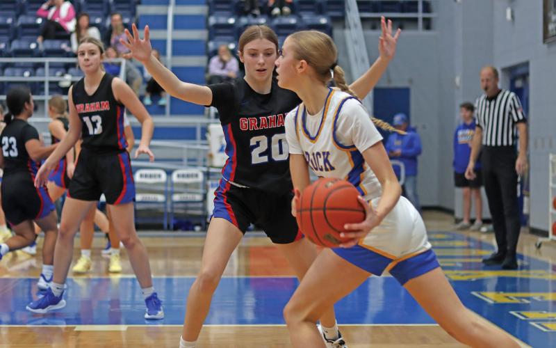(THOMAS WALLNER | THE GRAHAM LEADER) Katelyn McGehee attempts to block a Brock player during a game earlier in the season. McGehee was named Most Valuable Player for the Lady Blues team.