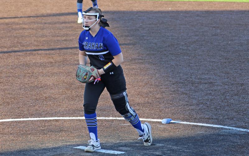 (ALEX HAVARDANSKY | THE GRAHAM LEADER) Zoey Harrell up on the mound for the Lady Blues in their matchup Tuesday, April 15 against the Lady Lions. Harrell dominated in the early innings of this contest for the Lady Blues.