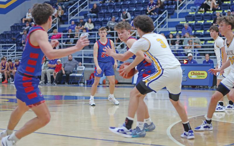 (THOMAS WALLNER | THE GRAHAM LEADER) Cooper Wilde looks for an open Steers teammate during the team’s district opener against Brock last Saturday, Jan. 11. After the team travels Tuesday, Jan. 14 to Brownwood, the team will return home Friday, Jan. 17 for a matchup against Mineral Wells.