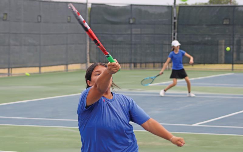 (ALEX HAVARDANSKY | THE GRAHAM LEADER) Jade Dospapas saves a ball defensively during her singles match Friday, Aug. 1. Dospapas was one of three girls who picked up a singles win against Peaster 8-6. 