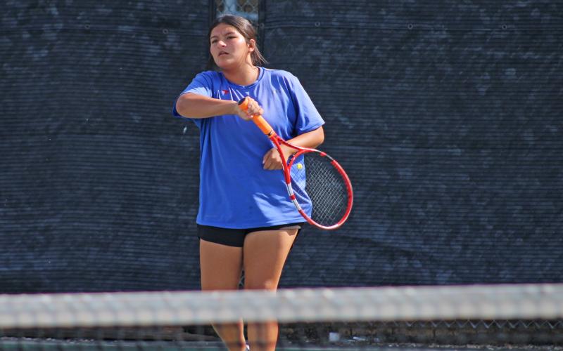 (ALEX HAVARDANKSY | THE GRAHAM LEADER) Jade Dospapas follows through on a return ball Tuesday, Sept. 16, against Vernon. Dospapas picked up one of two singles wins on the day for the Graham tennis team alongside Stacey Gonzalez.