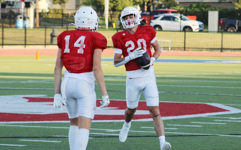 (ALEX HAVARDANKSY | THE GRAHAM LEADER) Jordan Alexander holds the ball after picking off a pass Thursday, Aug. 21. Alexander is one of the veteran leaders of this Steers team.