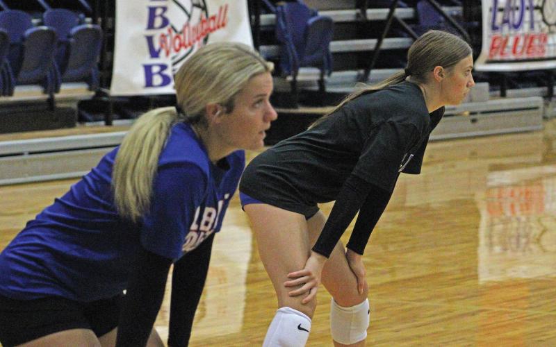(ALEX HAVARDANSKY | THE GRAHAM LEADER) Kaden Atwood and Katy McGehee prepare to return a serve Saturday, Aug. 9. Both of these players will serve as veteran leaders on the team going into the year.