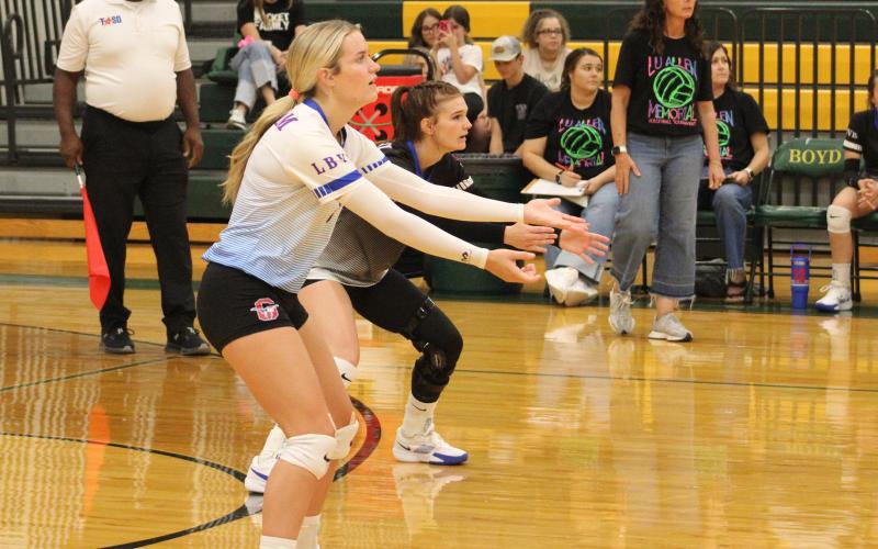 (ALEX HAVARDANSKY | THE GRAHAM LEADER) Kaden Atwood and Tara Dawson set up in the back row for a serve receive opportunity Tuesday, Aug. 26. Atwood and Dawson are two senior fixtures of the team. 