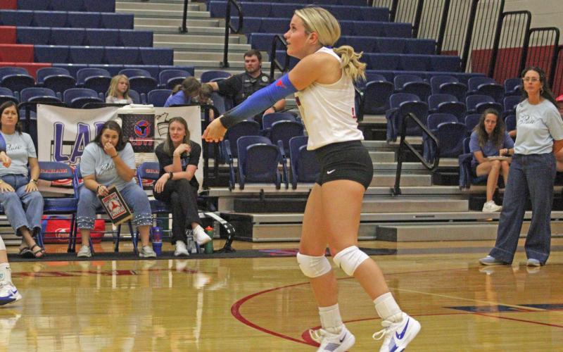 (ALEX HAVARDANKSY | THE GRAHAM LEADER) Kaden Atwood sets up a serve receive attempt Friday, Sept. 12. Atwood is the defensive anchor of the team and helped the Lady Blues pick up their first point of the evening after a dig.