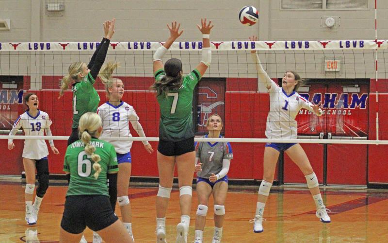 (ALEX HAVARDANKSY | THE GRAHAM LEADER) Katy McGehee tips a ball over the net Friday, Sept. 5. McGehee recorded eight kills against Iowa Park along with 17 digs. 